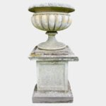 A Very large And Substantial English Stone Urn And Pedestal