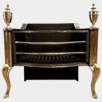 An English  Brass And Wrought Iron Fire Basket By Thomas Elsley